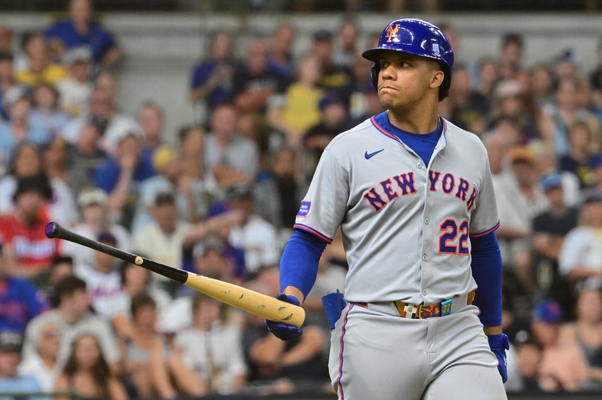 New York Mets right fielder Juan Soto (22) draws a walk in the ninth inning against the Milwaukee Brewers at American Family Field.