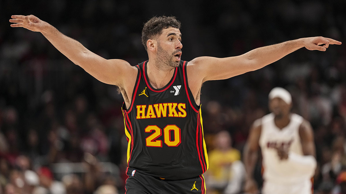 Atlanta Hawks forward Georges Niang (20) reacts after making a three point shot against the Miami Heat during the second half at State Farm Arena.