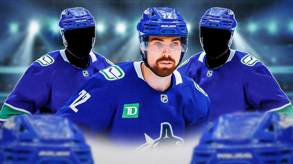 Filip Chytil in middle, one silhouetted Vancouver Canucks player on each side (no C or A or numbers on jersey), hockey rink in background