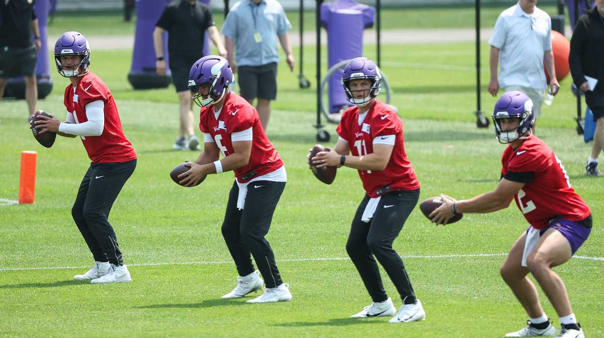 Minnesota Vikings quarterback J.J. McCarthy (9), quarterback Sam Howell (8), quarterback Brett Rypien (11) and quarterback Max Brosmer (12) practice during minicamp at the Minnesota Vikings Training Facility.