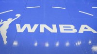 WNBA logo is seen on the court before a basketball game between the Chicago Sky and Minnesota Lynx at Wintrust Arena.