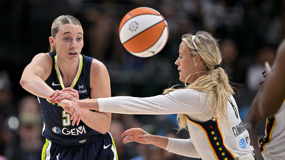 Dallas Wings guard Paige Bueckers (5) and Indiana Fever guard Sophie Cunningham (8) in action during the game between the Dallas Wings and the Indiana Fever at the American Airlines Center.