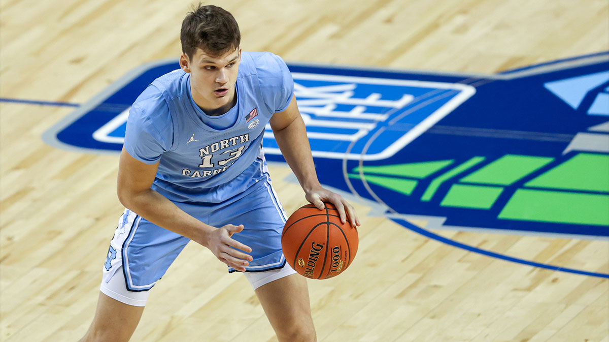 North Carolina Tar Heels forward Walker Kessler (13) looks to pass against the Virginia Tech Hokies in the quarterfinal round of the 2021 ACC tournament at Greensboro Coliseum. The North Carolina Tar Heels won 81-73.