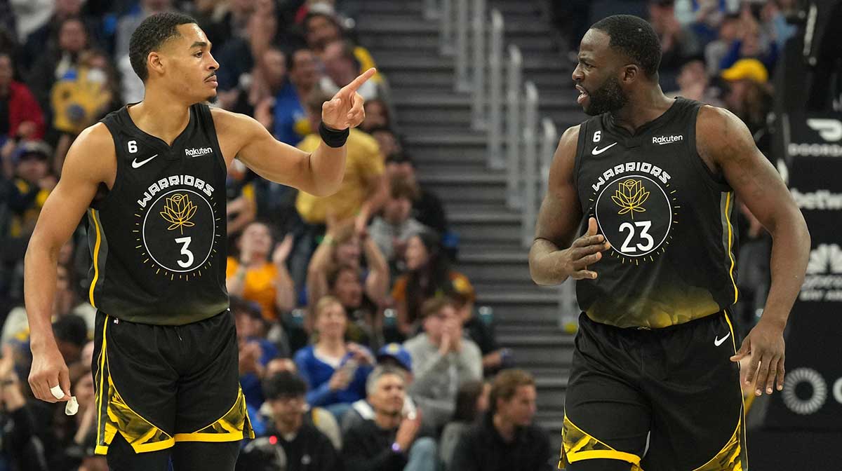 Warriors guard Jordan Poole (3) and forward Draymond Green (23) celebrate during the second quarter against the Utah Jazz at Chase Center