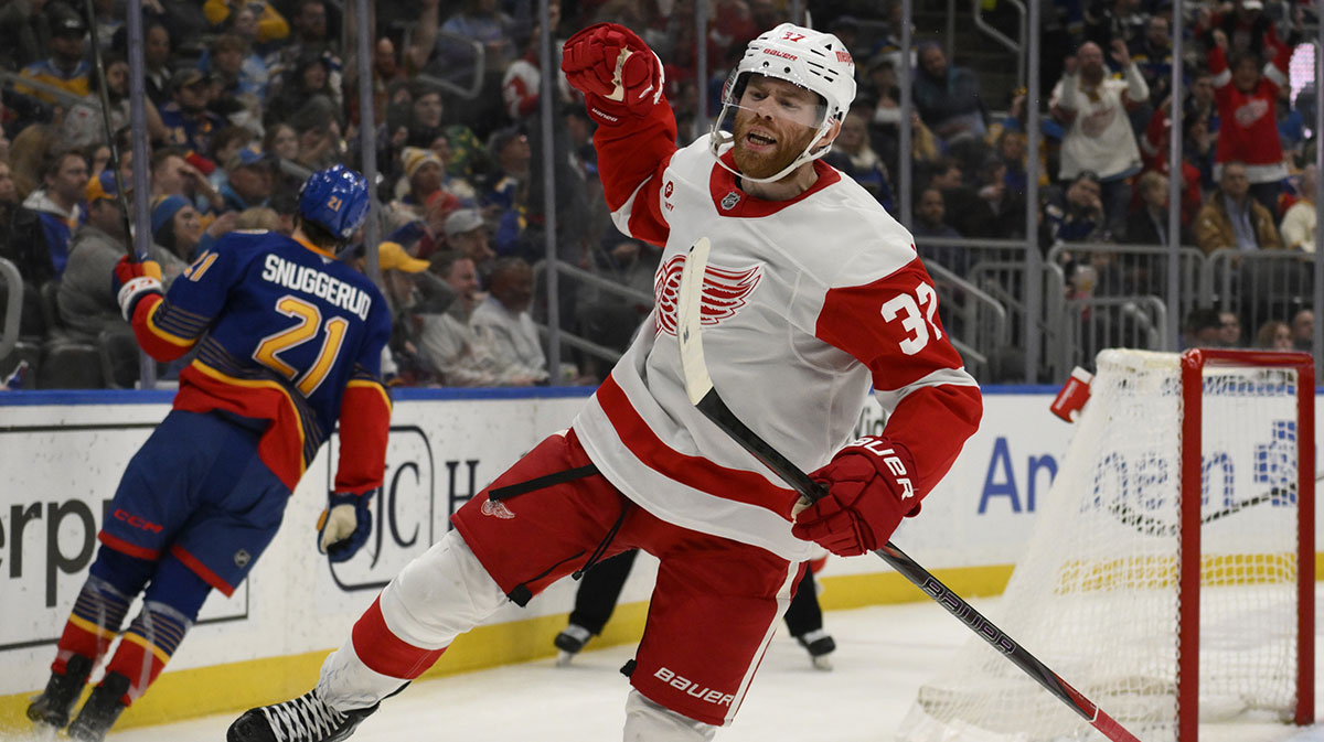 Detroit Red Wings left wing J.T. Compher (37) reacts after scoring a goal against the St. Louis Blues during the third period at Enterprise Center.