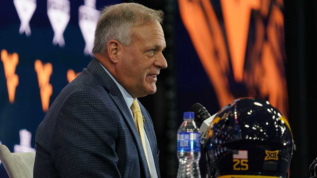 West Virginia head coach Rich Rodriguez speaks with the media during 2025 Big 12 Football Media Days at The Star.