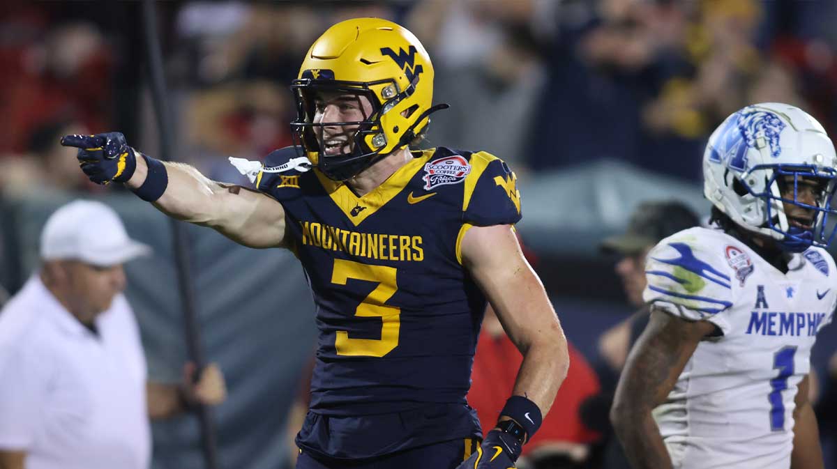 West Virginia Mountaineers wide receiver Hudson Clement (3) reacts after catching a pass against Memphis Tigers defensive back Davion Ross (1) in the fourth quarter at Toyota Stadium.