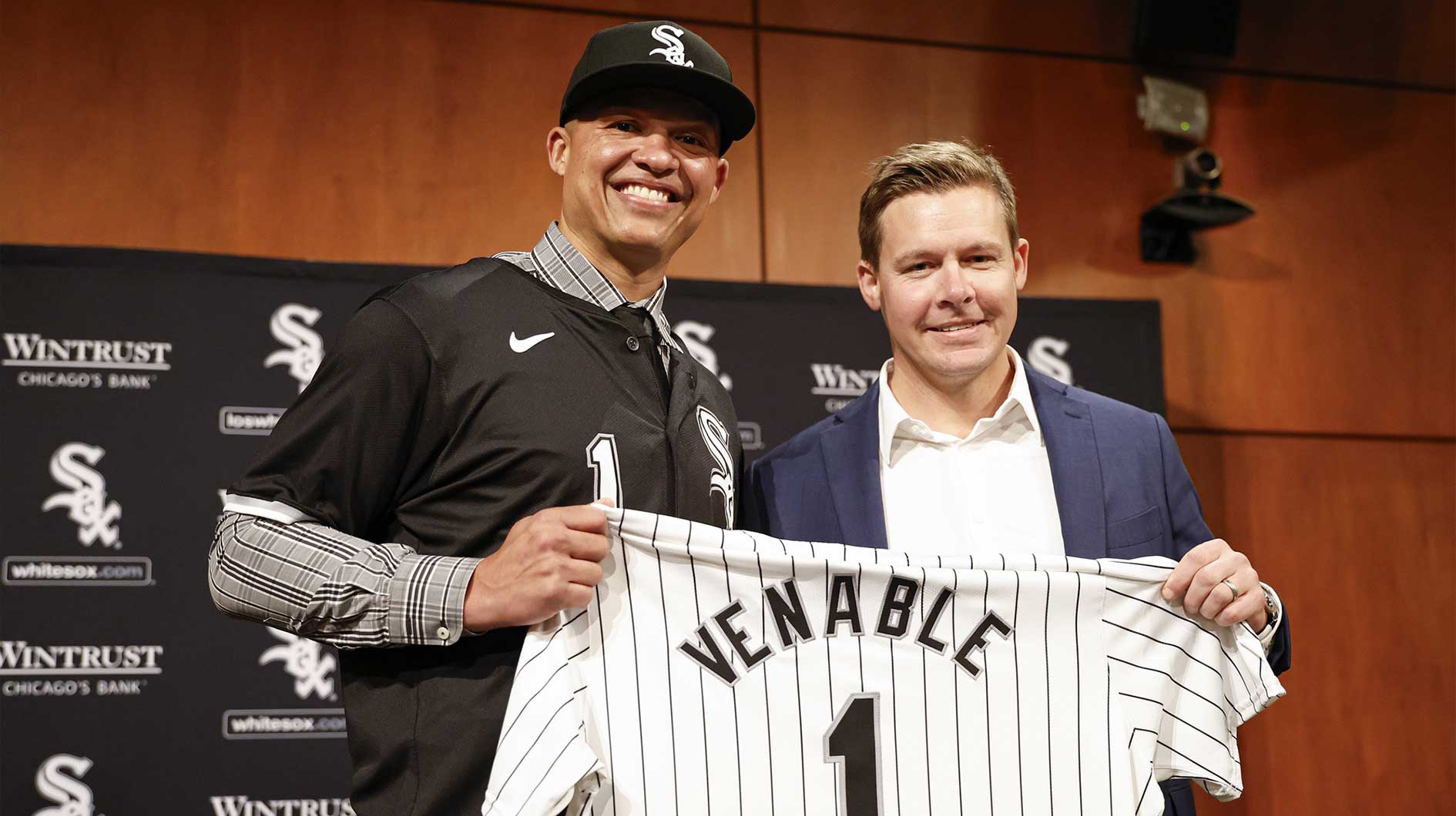 New Chicago White Sox manager Will Venable (R) poses for a photo with general manager Chris Getz (R) during a press conference at Guaranteed Rate Field.