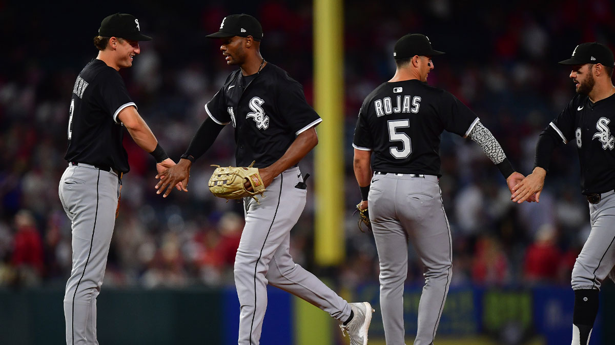 Aug 2, 2025; Anaheim, California, USA; Chicago White Sox shortstop Colson Montgomery (12) outfielder Luis Robert Jr. (88) second baseman Josh Rojas (5) and right fielder Mike Tauchman (18) celebrate the victory against the Los Angeles Angels at Angel Stadium.