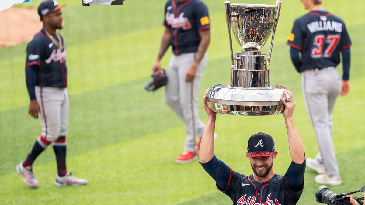 Eli White of the Atlanta Braves holds the trophy after the Braves defeated the Cincinnati Reds in the MLB Speedway Classic held at Bristol Motor Speedway in Bristol, Tenn., on August 3, 2025.