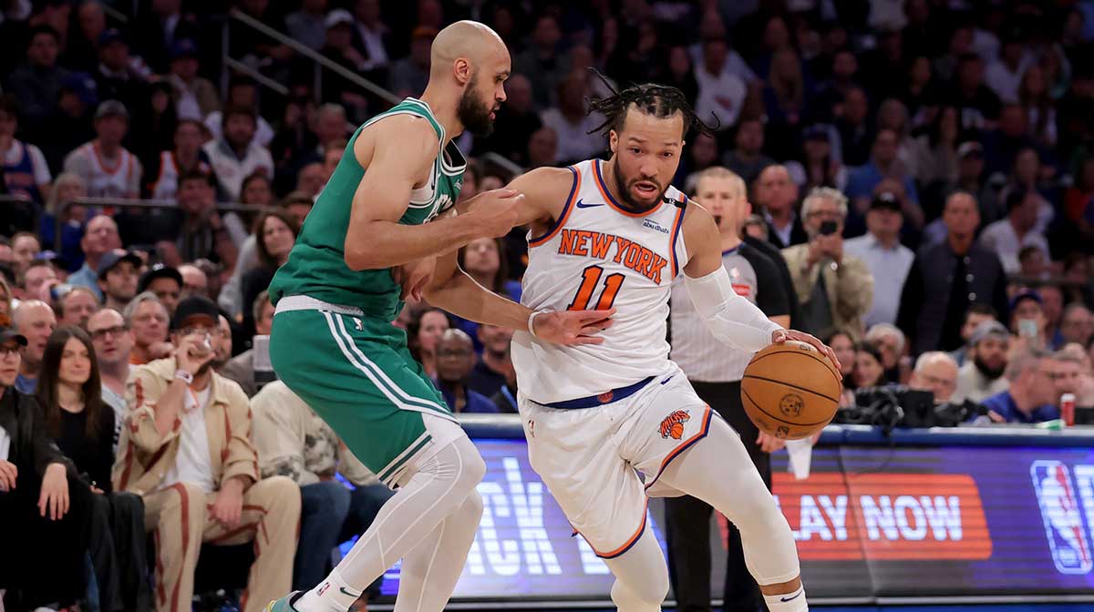 New York Knicks guard Jalen Brunson (11) drives to the basket against Boston Celtics guard Derrick White (9) during the second quarter of game six in the second round of the 2025 NBA Playoffs at Madison Square Garden.