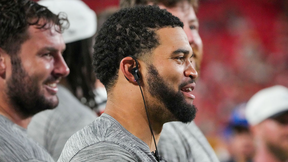Chicago Bears quarterback Caleb Williams (18) on the sidelines against the Kansas City Chiefs during the second half of the game at GEHA Field at Arrowhead Stadium.