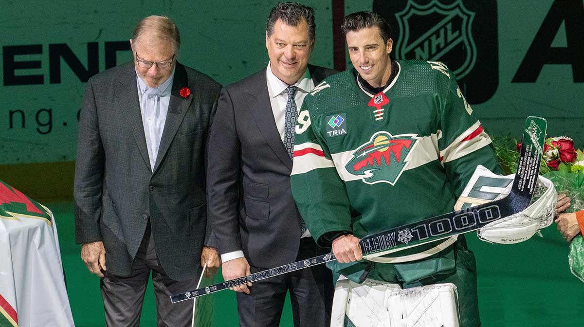  Minnesota Wild owner, Craig Leipold and general manager Bill Guerin award Minnesota Wild goaltender Marc-Andre Fleury (29) with a silver hockey stick in a pregame ceremony in honor of 552 wins and 1000 games played in the NHL before the game against the Pittsburgh Penguins at Xcel Energy Center. 