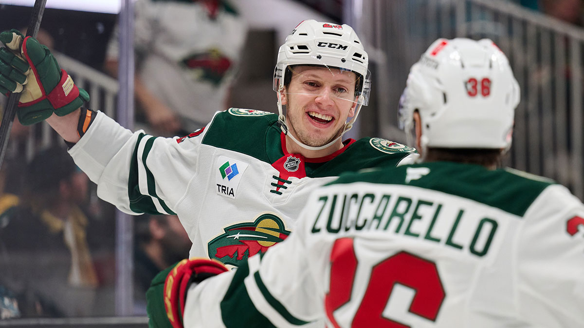 Minnesota Wild center Marco Rossi (23) celebrates with right wing Mats Zuccarello (36) after scoring a goal against the San Jose Sharks during the first period at SAP Center at San Jose.
