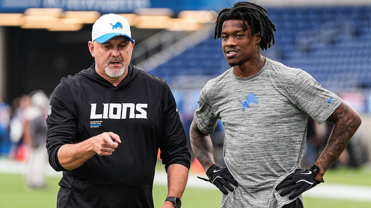 Detroit Lions offensive coordinator John Morton, left, talks to wide receiver Jameson Williams (1) at warm up ahead of the Hall of Fame Game at Tom Benson Hall of Fame Stadium in Canton, Ohio on Thursday, July 31, 2025.