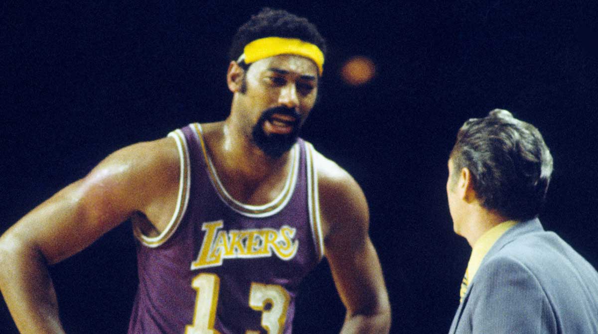 Los Angeles Lakers center Wilt Chamberlain (13) on the sideline.