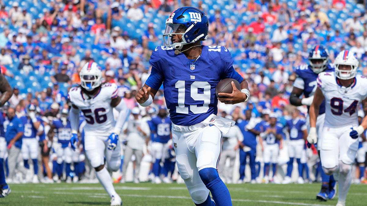 New York Giants quarterback Jameis Winston (19) runs with the ball against the Buffalo Bills during the second half at Highmark Stadium.