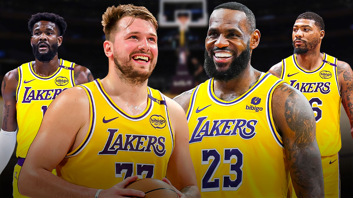Lakers' Luka Doncic and LeBron James smiling, with Deandre Ayton and Marcus Smart (in Lakers unis) beside them