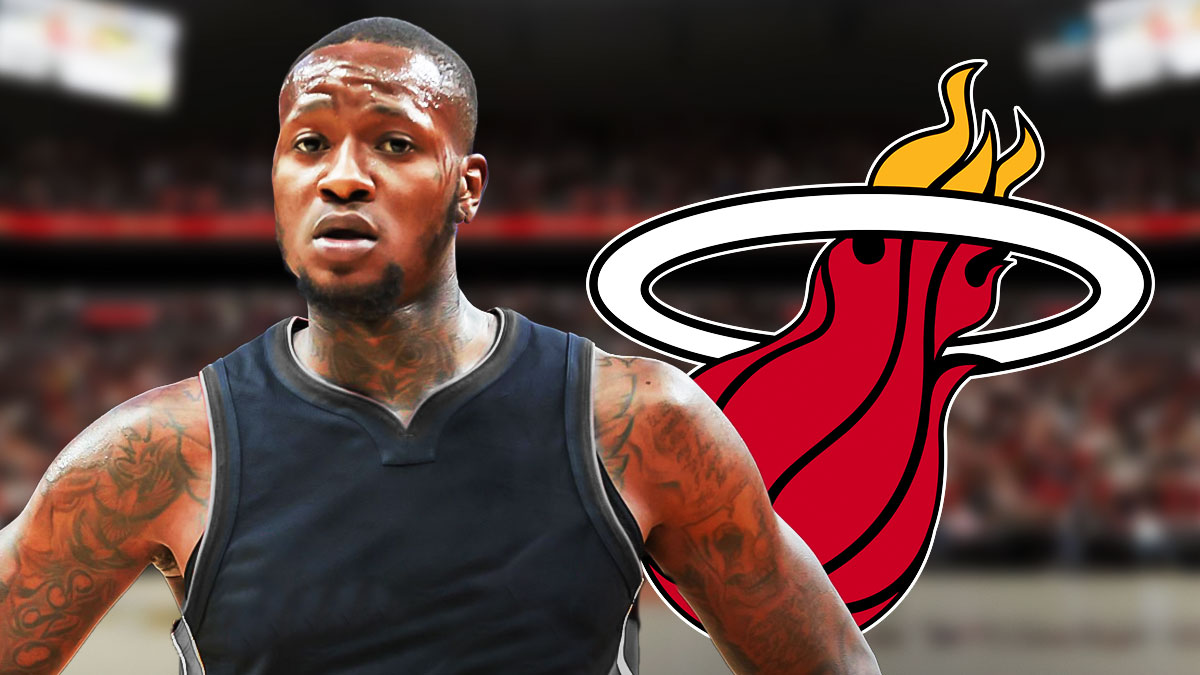 Terry Rozier in a blank uniform, Heat logo beside him