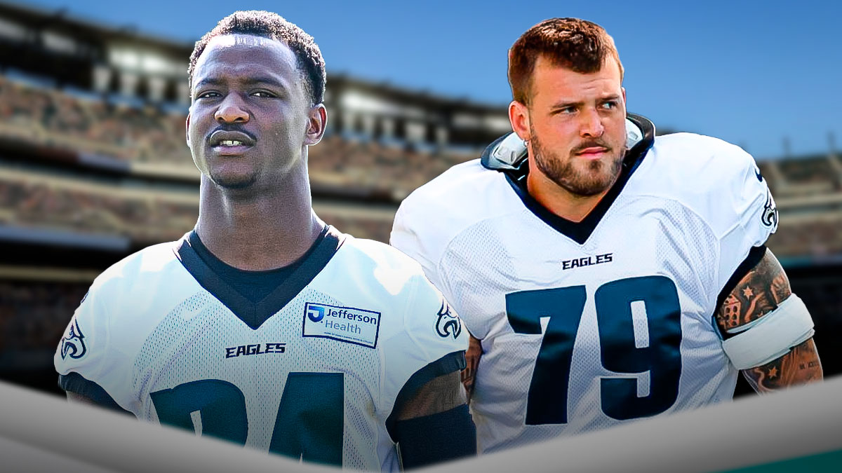 Andrew Mukuba and Trevor Keegan in Eagles uniform in front of the Eagles Stadium.