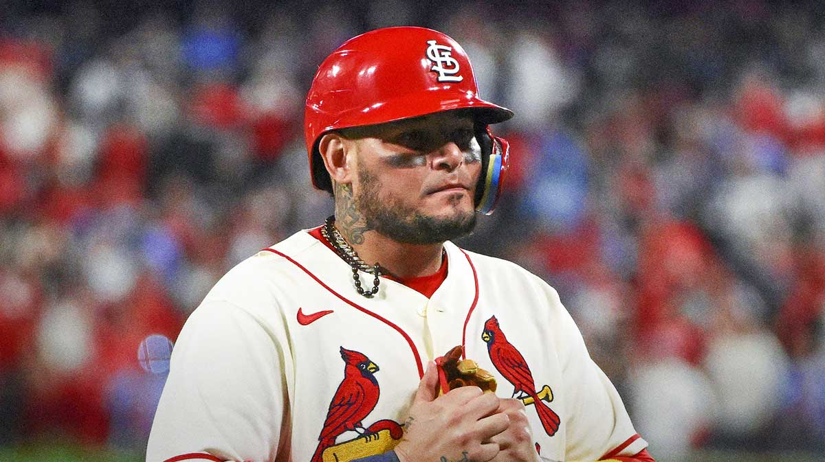 St. Louis Cardinals catcher Yadier Molina (4) walks off the field after hitting a single for his final postseason at bat in the ninth inning against the Philadelphia Phillies during game two of the Wild Card series for the 2022 MLB Playoffs at Busch Stadium