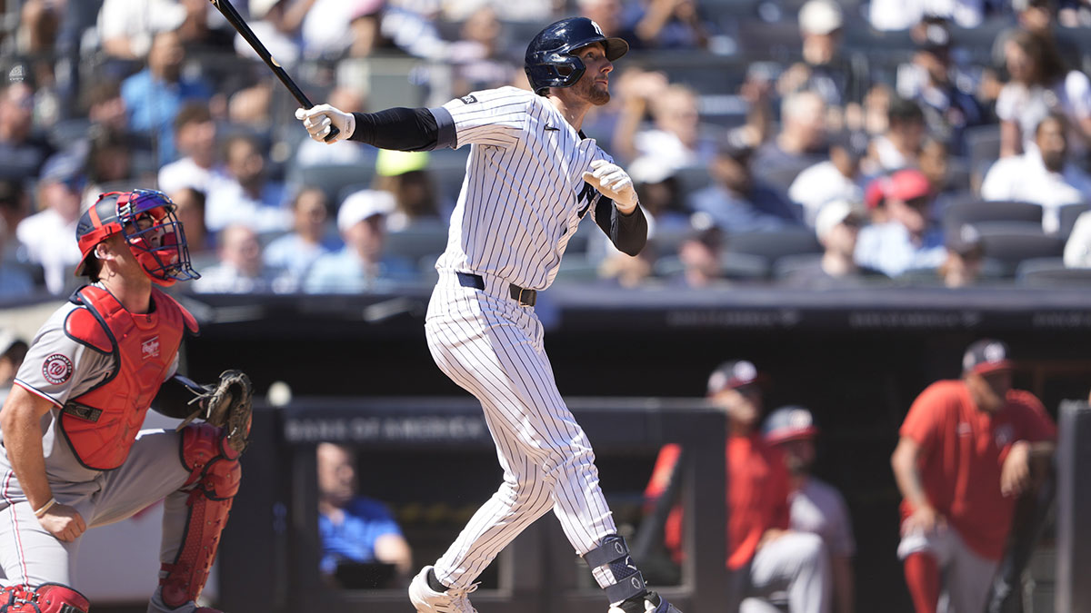New York Yankees third baseman Ryan McMahon (19) hits a three run home run against the Washington Nationals during the third inning at Yankee Stadium.