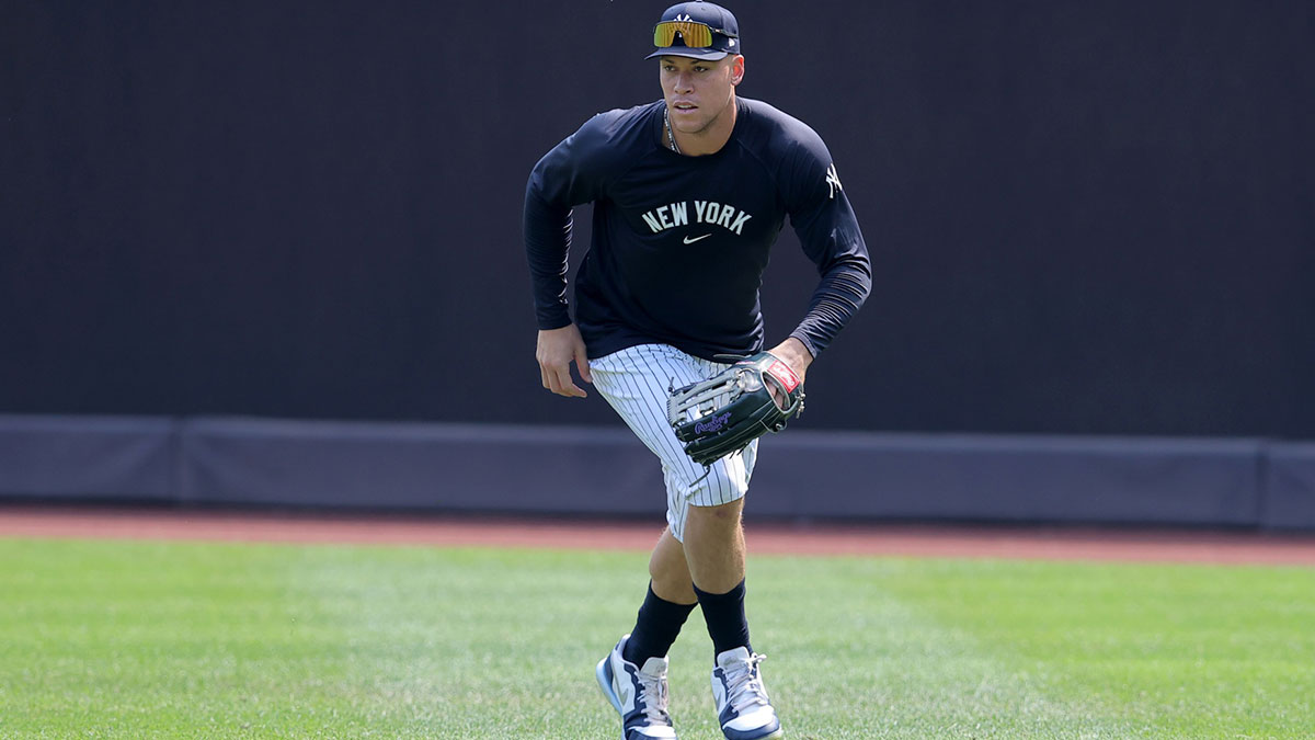New York Yankees injured right fielder Aaron Judge (99) works out in the outfield before a game against the Tampa Bay Rays at Yankee Stadium.