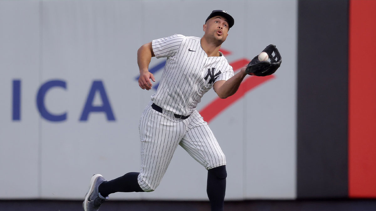 New York Yankees right fielder Giancarlo Stanton (27) catches a fly ball by Minnesota Twins designated hitter Luke Keaschall (not pictured) during the fourth inning at Yankee Stadium.