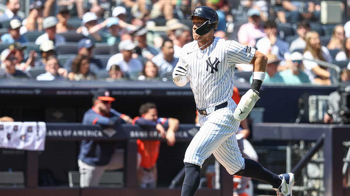 New York Yankees designated hitter Aaron Judge (99) runs to home plate in the first inning against the Houston Astros at Yankee Stadium.