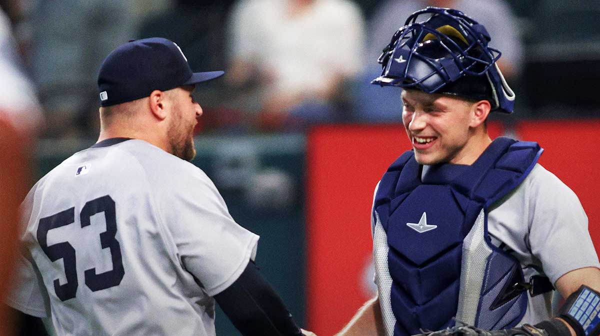 New York Yankees relief pitcher David Bednar (53) is congratulated by catcher Ben Rice (22) after the game against the Texas Rangers at Globe Life Field.