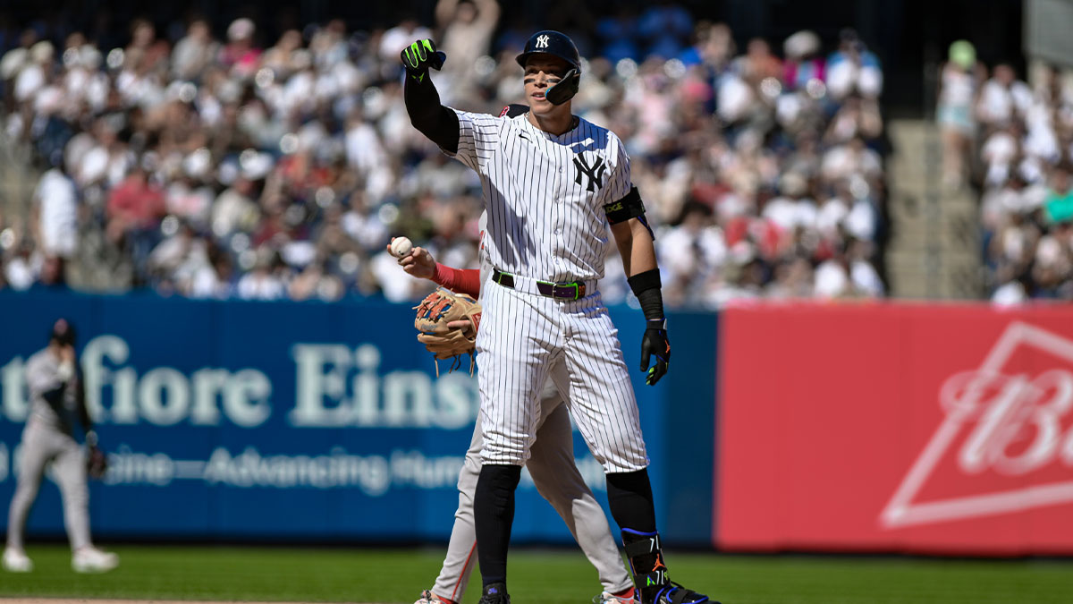 New York Yankees outfielder Aaron Judge (99) reacts after hitting a double against the Boston Red Sox during the eighth inning at Yankee Stadium.