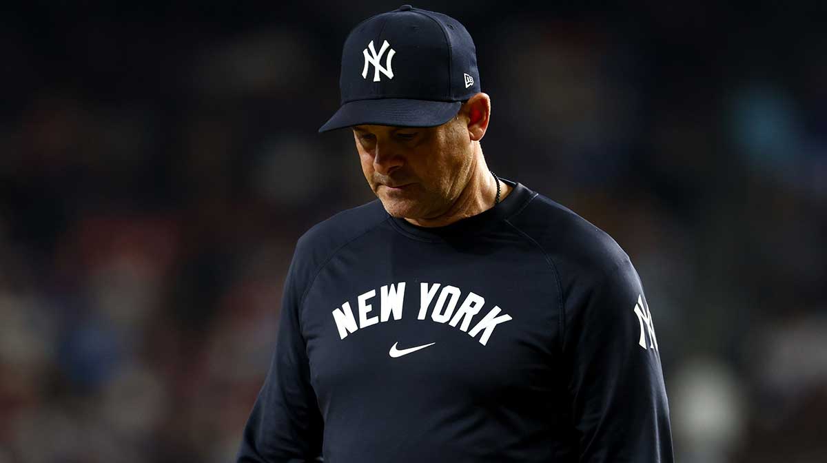 New York Yankees manager Aaron Boone (17) reacts during the eighth inning against the Texas Rangers at Globe Life Field.