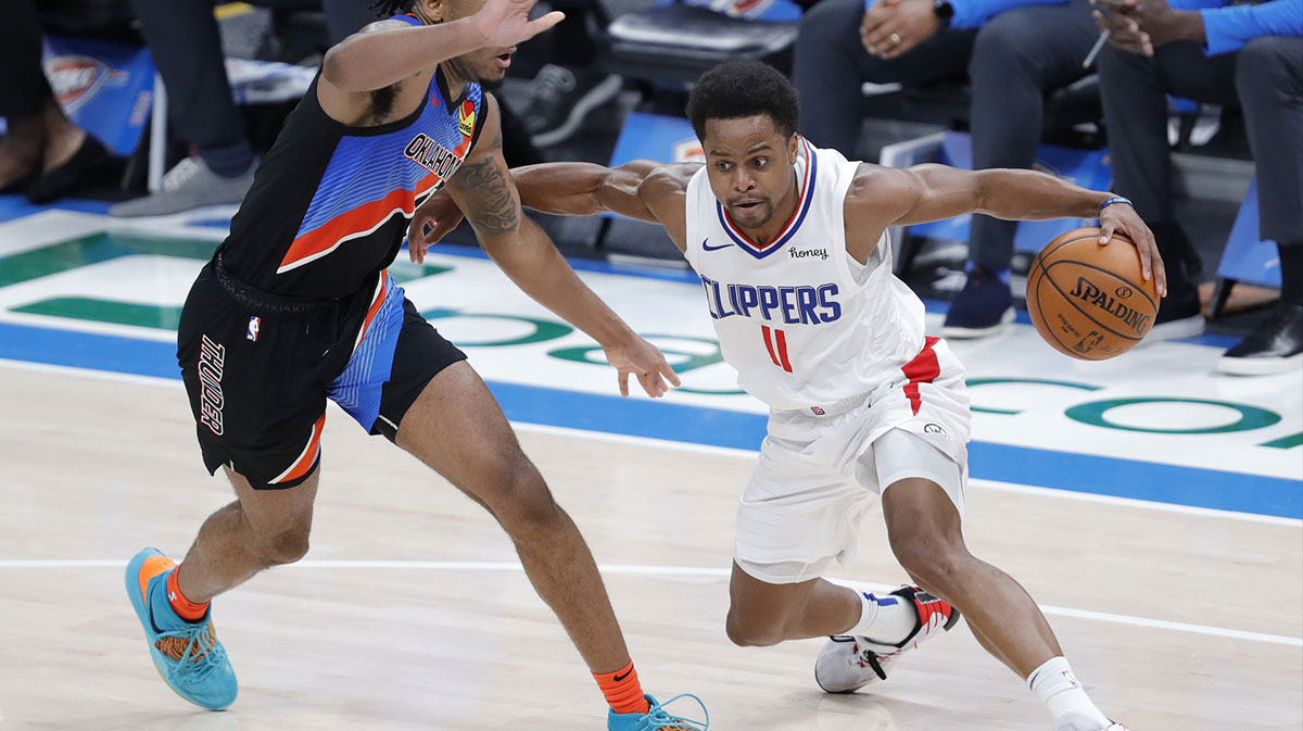 Los Angeles Clippers guard Yogi Ferrell (11) against the Phoenix Suns in game five of the Western Conference Finals for the 2021 NBA Playoffs at Phoenix Suns Arena. 