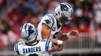 Carolina Panthers quarterback Bryce Young (9) celebrates with tight end Ja'Tavion Sanders (0) after a touchdown run against the Atlanta Falcons in the second quarter at Mercedes-Benz Stadium.