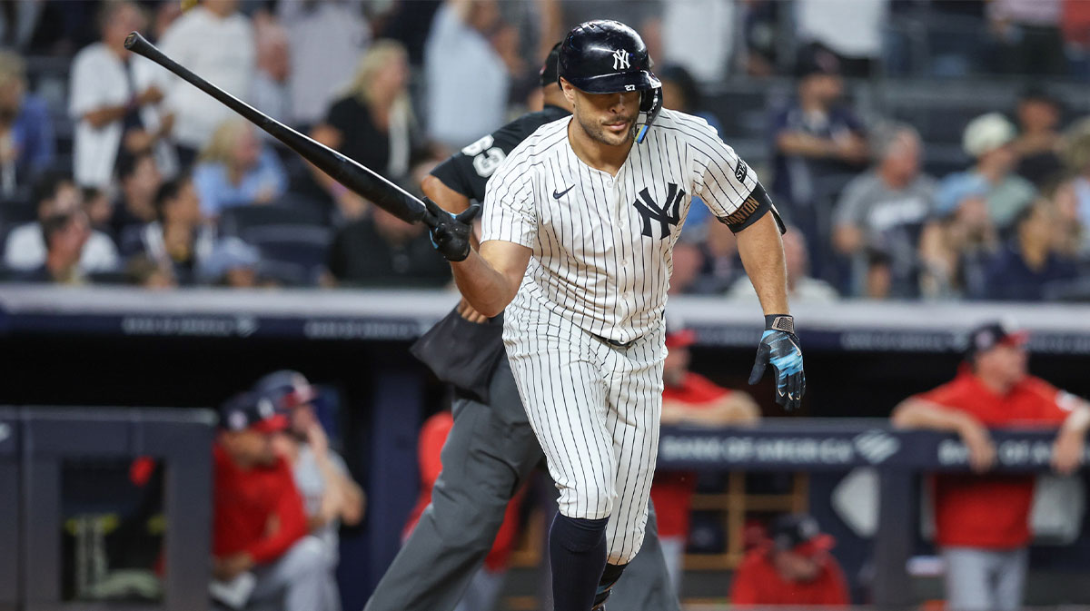 New York Yankees right fielder Giancarlo Stanton (27) hits a two run home run in the sixth inning against the Washington Nationals at Yankee Stadium.