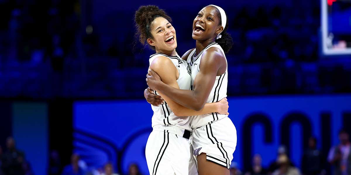 Golden State Valkyries guard Veronica Burton (22) celebrates with Golden State Valkyries guard Kaila Charles (6) after the game against the Dallas Wings.