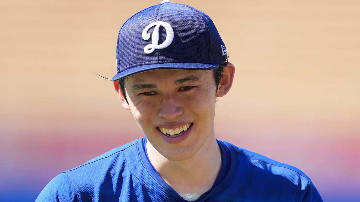 Los Angeles Dodgers pitcher Roki Sasaki (11) reacts before the game against the Toronto Blue Jays at Dodger Stadium.