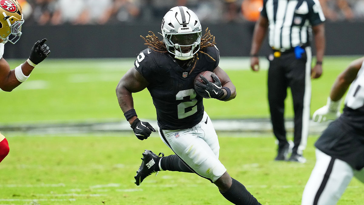 Raiders running back Ashton Jeanty (2) rushes against the San Francisco 49ers during the first quarter at Allegiant Stadium.