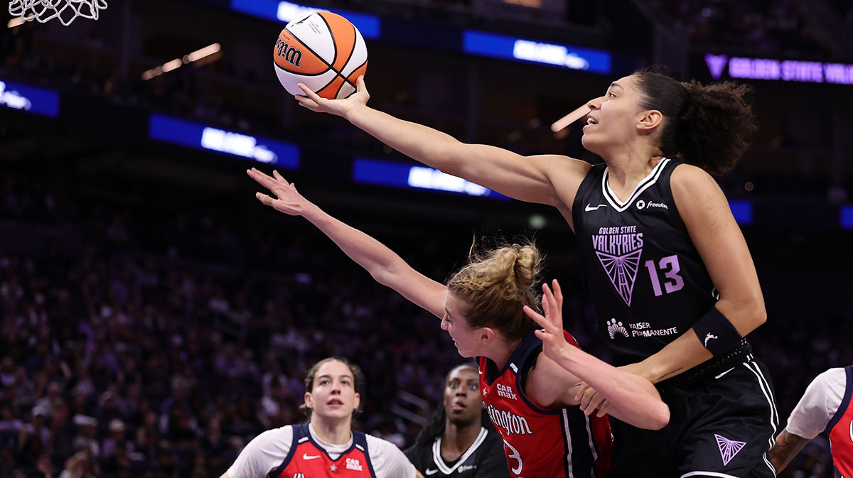 Golden State Valkyries forward Janelle Salaun (13) shoots the ball above Washington Mystics guard Lucy Olsen (33) during the fourth quarter at Chase Center.
