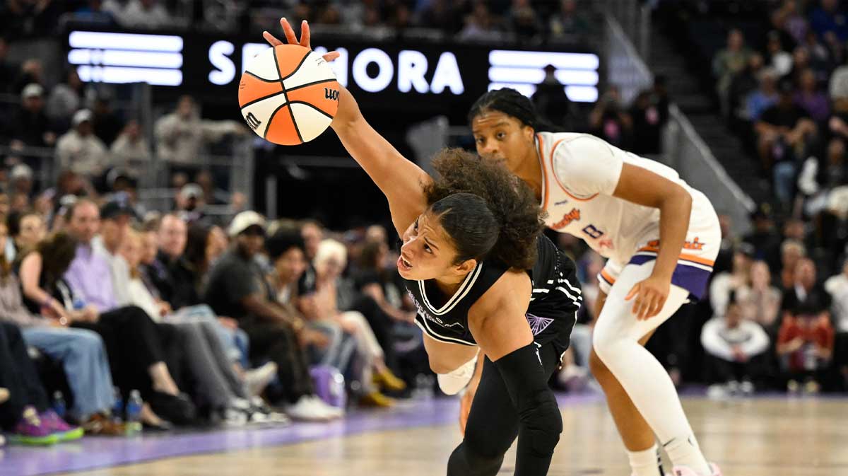 Golden State Valkyries guard Veronica Burton (22) gets fouled by Phoenix Mercury guard Monique Akoa Makani (8) in the fourth quarter at Chase Center. 