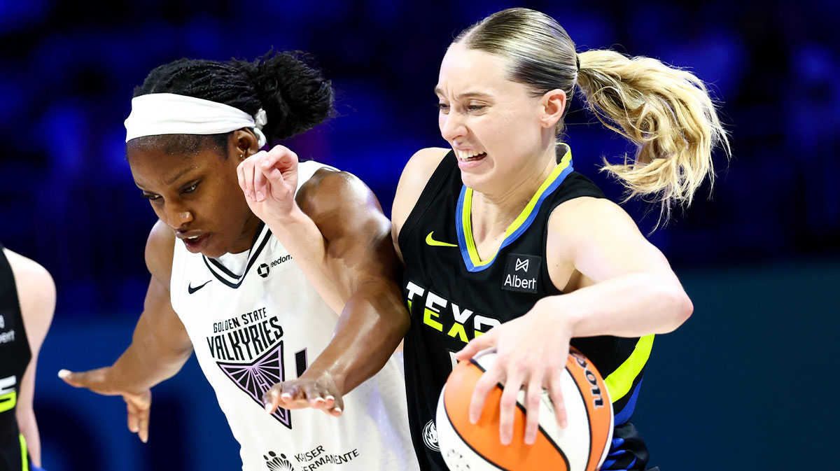 Dallas Wings guard Paige Bueckers (5) drives to the basket as Golden State Valkyries guard Kaila Charles (6) defends during the second half at College Park Center. 
