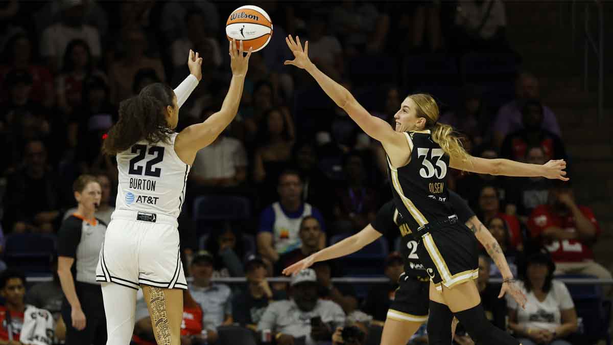 Golden State Valkyries guard Veronica Burton (22) shoots the ball over Washington Mystics guard Lucy Olsen (33) in the second half at CareFirst Arena.