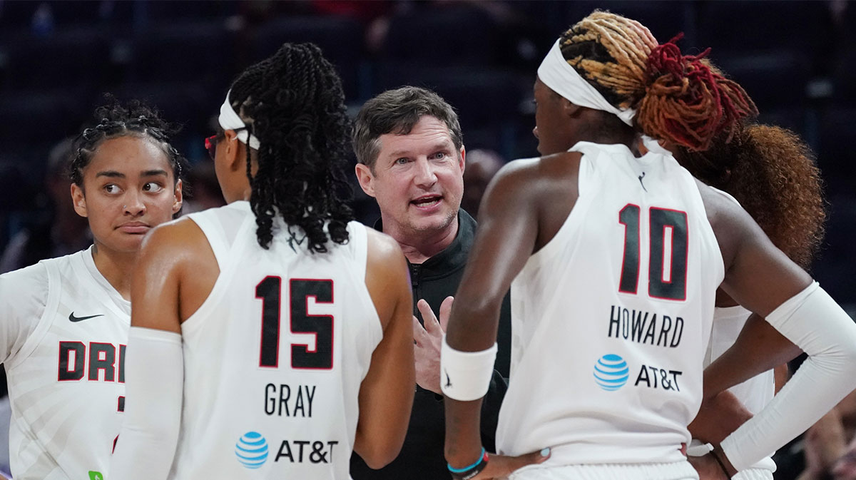 Atlanta Dream head coach Karl Smesko talks with the team during a timeout in the third quarter against the Golden State Valkyries at Chase Center.