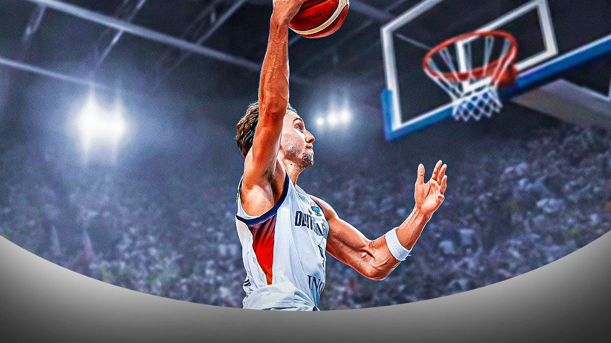 Franz Wagner is Germany Jersey dunking the basketball. 3 Franz Wagner bold predictions for Germany’s EuroBasket quarterfinal vs. Slovenia