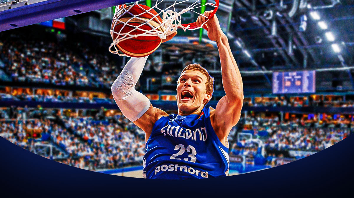 Lauri Markkanen in Finland jersey dunking the ball. 3 Lauri Markkanen bold predictions for Finlands’s EuroBasket quarterfinal vs. Georgia