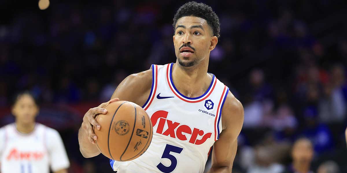 Philadelphia 76ers guard Quentin Grimes (5) controls the ball against the Portland Trail Blazers during the second quarter at Wells Fargo Center.