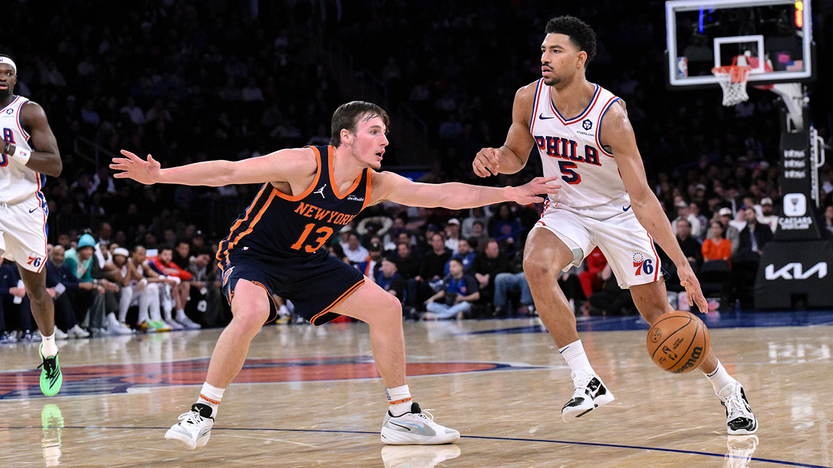 76ers guard Quentin Grimes (5) dribbles the ball as New York Knicks guard Tyler Kolek (13) defends during the second half at Madison Square Garden