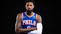 76ers Paul George poses for a photo during media day