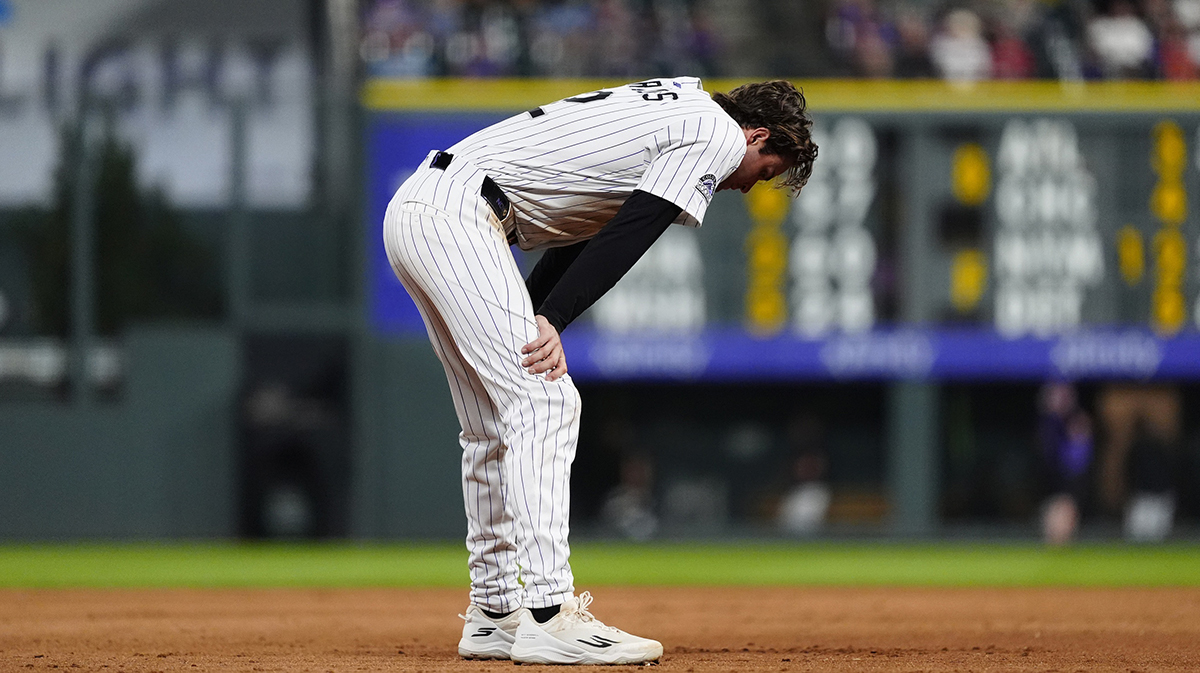 Colorado Rockies third baseman Kyle Karros (12) reacts after striking out in the sixth inning against the San Francisco Giants at Coors Field.