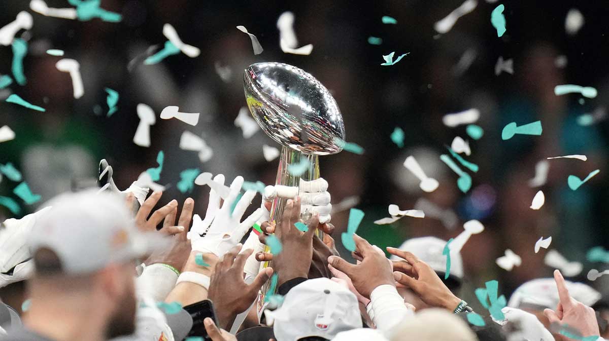 The Philadelphia Eagles hoist the Vince Lombardi Trophy after defeating the Kansas City Chiefs in Super Bowl LIX at Ceasars Superdome.